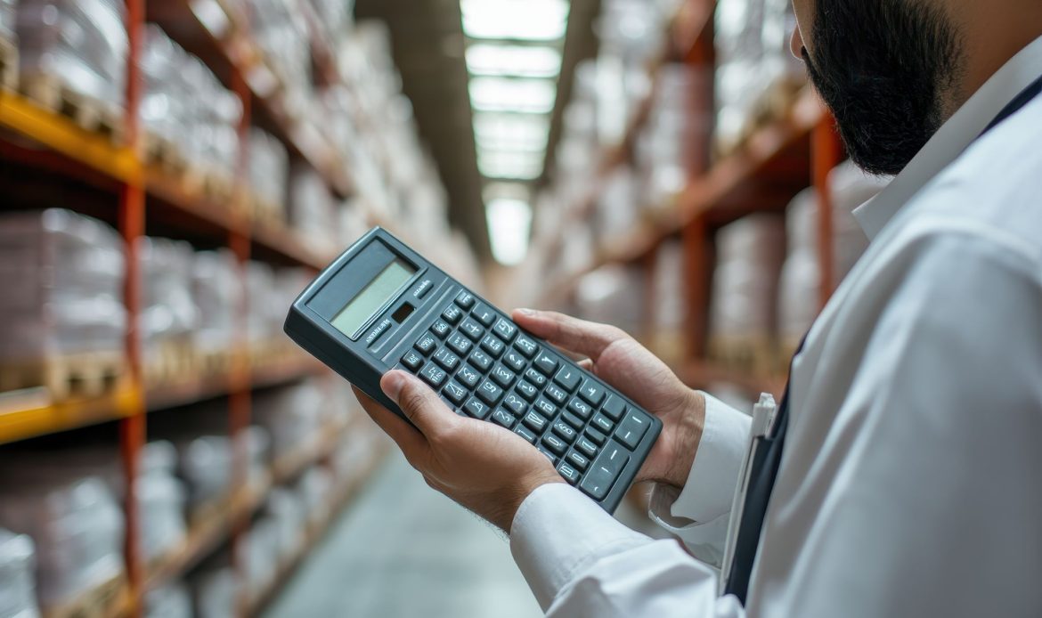 Young Man Doing Inventory and Calculation