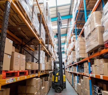 Green Fulfilment Warehouse with Boxes