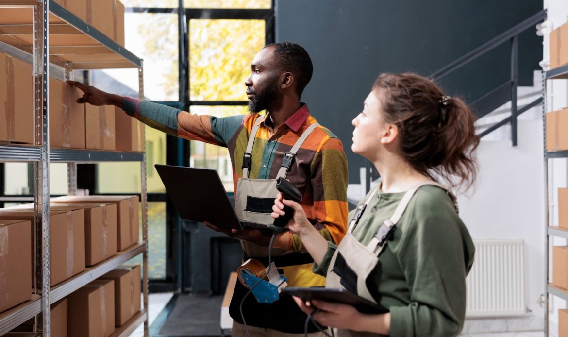 Young woman and man doing inventory