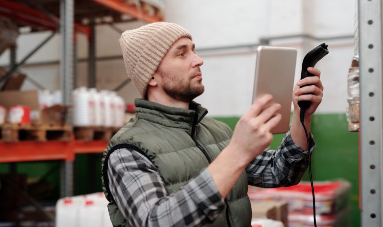 Young Man Working on Warehouse
